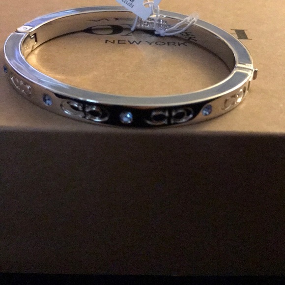 Coach Jewelry - Coach Kissing C Hinged Bangle